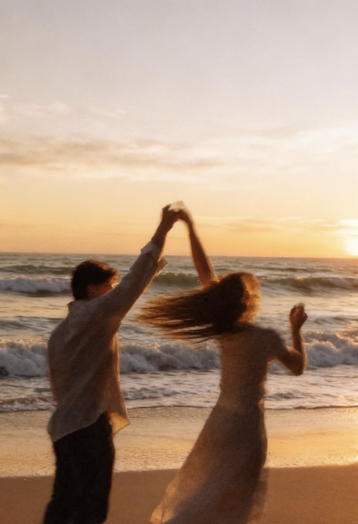 Dancing at golden hour on the sand